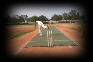 Cricket in Tamil Nadu - Bowler and Batsman in action